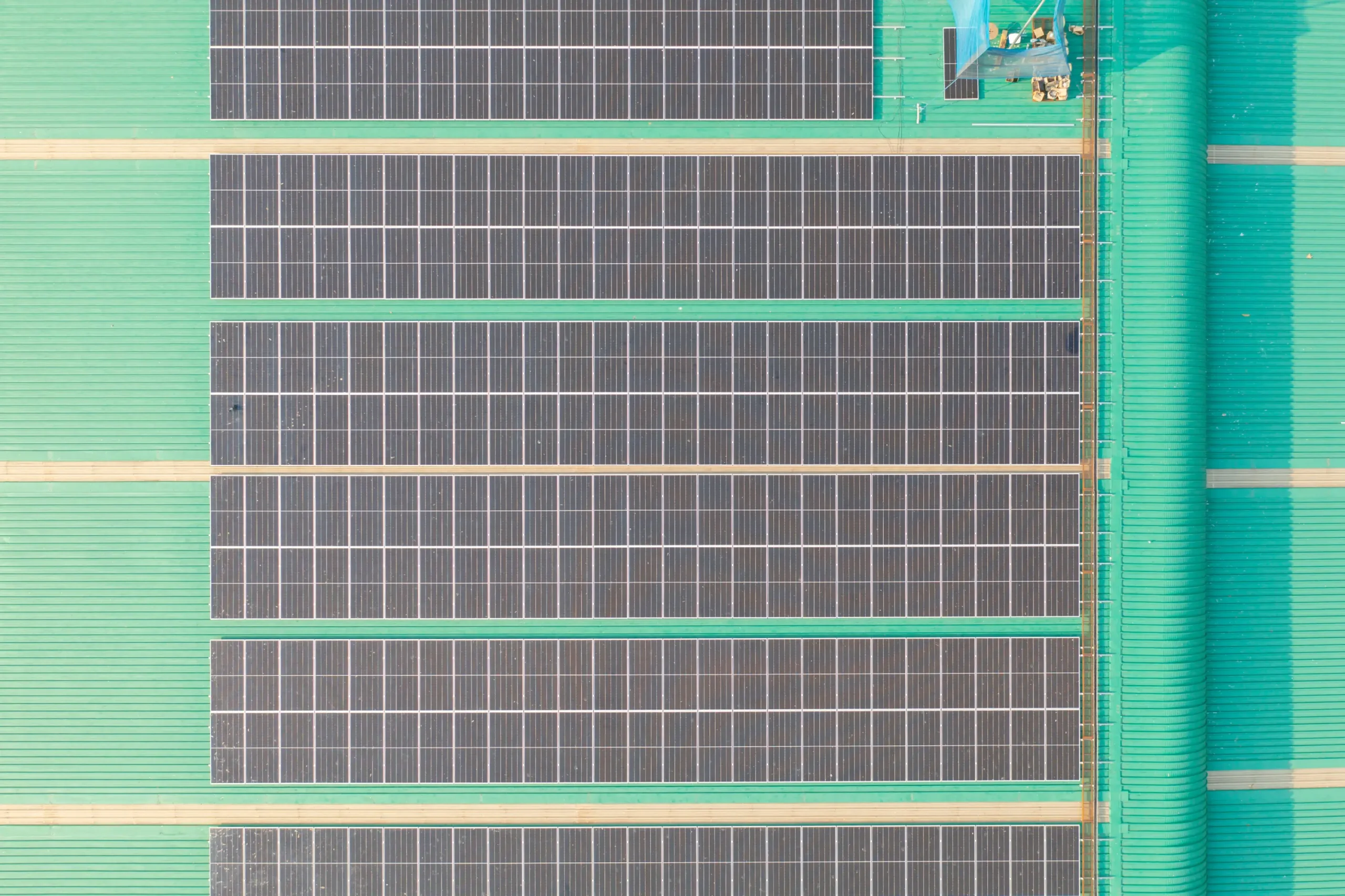 Aerial view of solar panels on a commercial roof